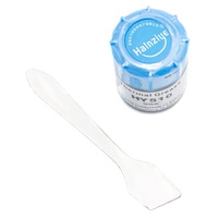 Tarro y aplicador de pasta térmica